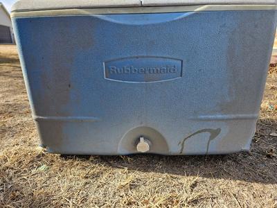 Rubbermaid cooler and a new Coleman griddle and a small umbrella