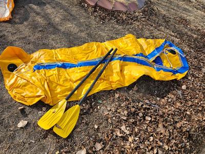 Sevylor rubber raft with oars