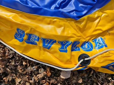 Sevylor rubber raft with oars