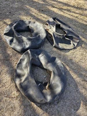 Three rubber river tubes