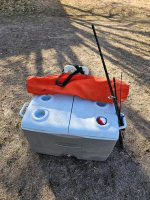 Rubbermaid cooler with folding chair and two fishing rods