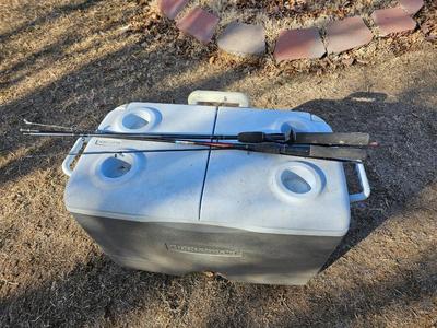 Rubbermaid cooler with folding chair and two fishing rods