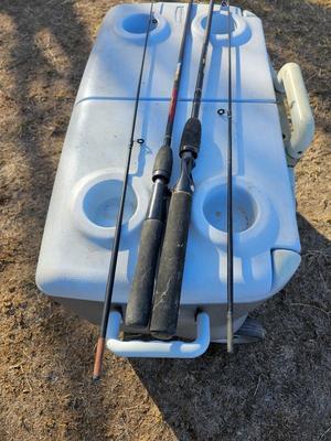 Rubbermaid cooler with folding chair and two fishing rods