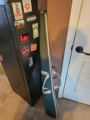 Gun safe with rifle case - Gun cabinet needs lock replaced. comes with contents