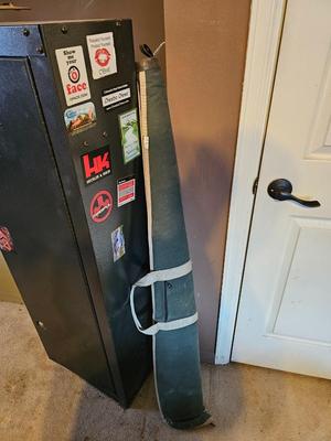 Gun safe with rifle case - Gun cabinet needs lock replaced. comes with contents