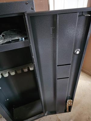 Gun safe with rifle case - Gun cabinet needs lock replaced. comes with contents