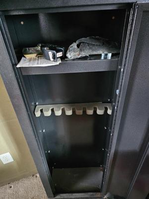 Gun safe with rifle case - Gun cabinet needs lock replaced. comes with contents