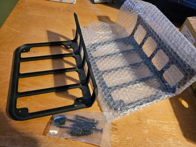 Two metal taillight covers for Jeep - Brand new ordered and they were the wrong size.