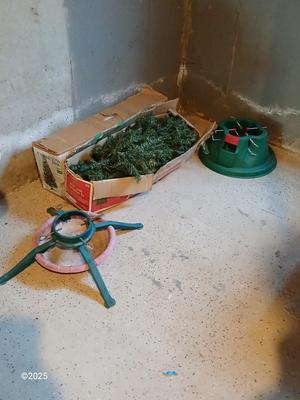 Two faux Chistmas trees with stands