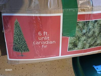 Two faux Chistmas trees with stands