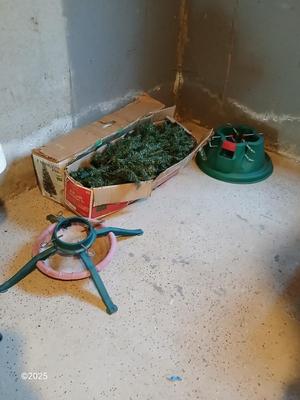 Two faux Chistmas trees with stands