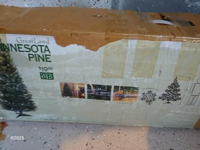 Two faux Chistmas trees with stands