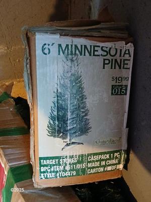Two faux Chistmas trees with stands