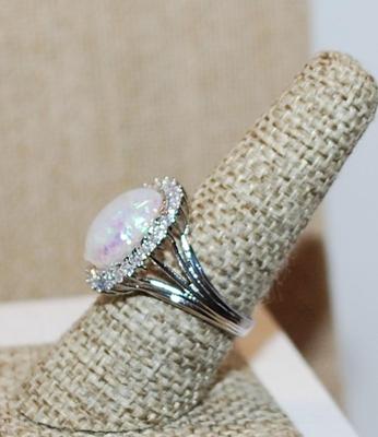 Size 8 Large Oval Iridescent White Opal-Style Main Stone with an Oval Surround on a Silver Tone Band (4.7g)