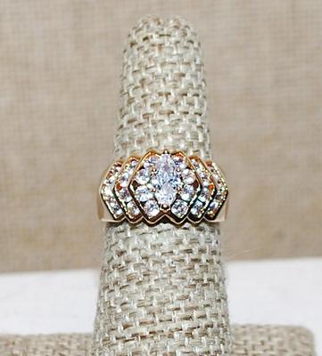 Size 6 Marked .925 Marquise Cut Main Stone with 6 Tiers of Quadruple Side Accent Stones on a Gold Band (5.0g)