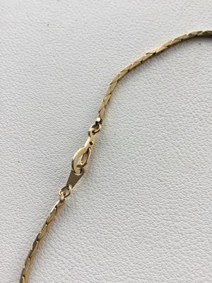 Unmarked gold tone chain like necklace