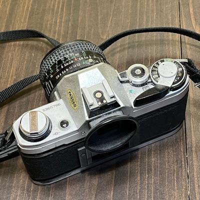 LOT 54W: Vintage 35mm Film Camera - Cannon AE-1 with Two Lenses and Manuals