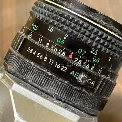 LOT 54W: Vintage 35mm Film Camera - Cannon AE-1 with Two Lenses and Manuals