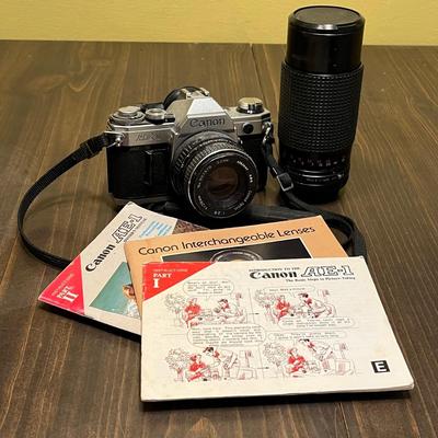 LOT 54W: Vintage 35mm Film Camera - Cannon AE-1 with Two Lenses and Manuals