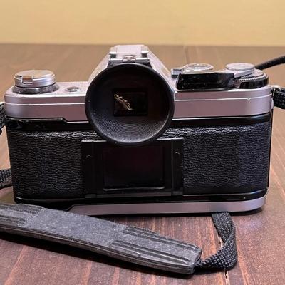 LOT 54W: Vintage 35mm Film Camera - Cannon AE-1 with Two Lenses and Manuals