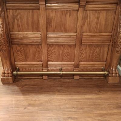 LOT 86B: Vintage Lion Head Oak Bar with Brass Top and Footrest & Set of (2) Swivel Oak Bar Stools