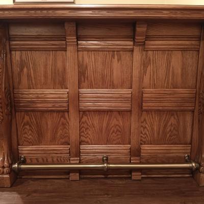 LOT 86B: Vintage Lion Head Oak Bar with Brass Top and Footrest & Set of (2) Swivel Oak Bar Stools