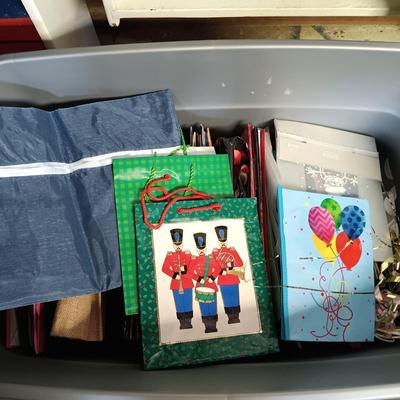 LOT 101B: Basement Finds- Large Collection of Assorted Holiday Bags w/ Christmas Decor