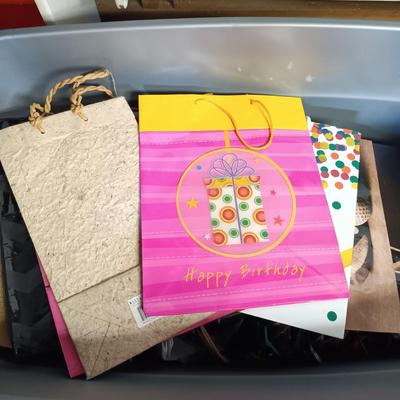 LOT 101B: Basement Finds- Large Collection of Assorted Holiday Bags w/ Christmas Decor
