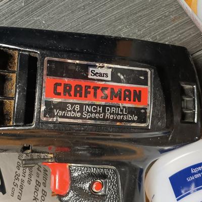 LOT 108B: Basement Finds- Craftsman 3/8" Corded Drill, Jorgensen Bar Clamps, Flood Lights & More