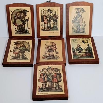 LOT 115L: Set of (7) Hummel Goebel Wood Wall Art Plaques