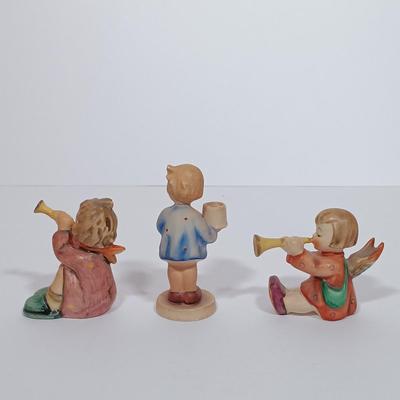 LOT 118L: Vintage Hummel Goebel Figurines Angel 'Joyous News' candle holder , 'Girl with Nosegay' candle holder &...