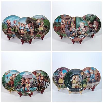 LOT 127L: The Danbury Mint Set of (12) Hummel Little Companions Collectible Plates