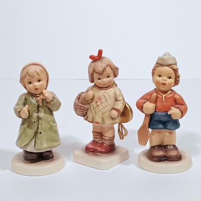 LOT 132L: Goebel Hummel Club Figurines 'First Mate', 'I Brought You a Gift' & 'Keeping Time'