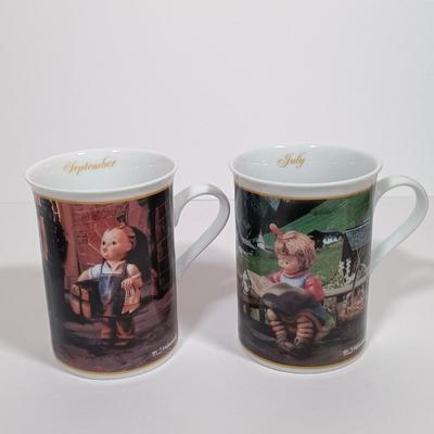 LOT 135L: The Danbury Mint Hummel Porcelain Calendar Mugs