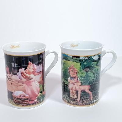 LOT 135L: The Danbury Mint Hummel Porcelain Calendar Mugs