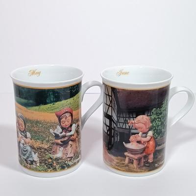 LOT 135L: The Danbury Mint Hummel Porcelain Calendar Mugs