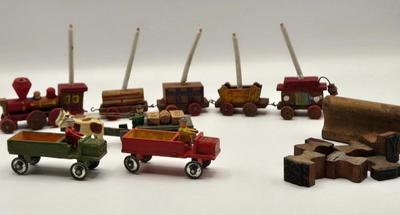 LOT 554: Miniature Wooden Train, Trucks, & Wooden Stamper Set
