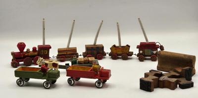 LOT 554: Miniature Wooden Train, Trucks, & Wooden Stamper Set
