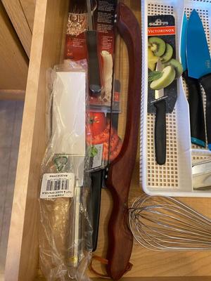AN ARRAY OF KITCHEN KNIFES, ACHIP CORRECTOR, AND MORE