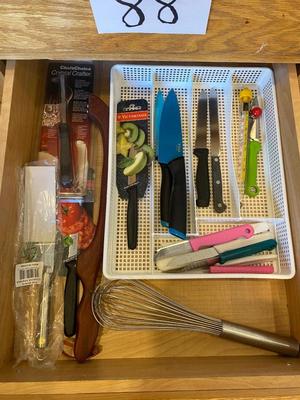 AN ARRAY OF KITCHEN KNIFES, ACHIP CORRECTOR, AND MORE