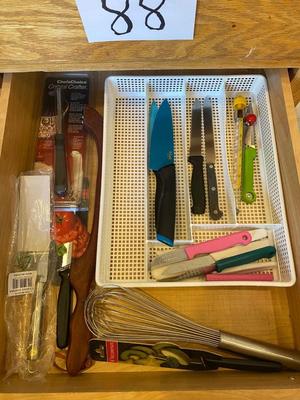 AN ARRAY OF KITCHEN KNIFES, ACHIP CORRECTOR, AND MORE