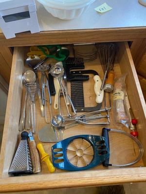 A BUNCH OF KITCHEN DRAWER UTENSILS ITEMS