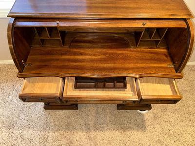 A SMALLER SIZED ROLL TOP DESK