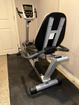 SCHWINN ERGONOMIC STATIONARY EXERCISE BIKE PLUS HAND WEIGHTS AND BALL