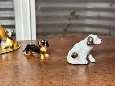 SKI COUNTRY BOURBON EMPTY DECANTER AND MINIATURE PORCELAIN DOGS