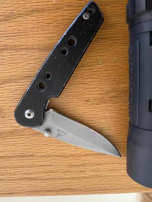 BUSHNELL BINOCULARS AND A GERBER POCKET KNIFE