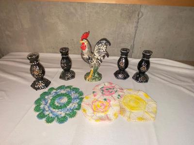 ROOSTER, CANDLESTICK HOLDERS, AND COLORFUL DOILIES,