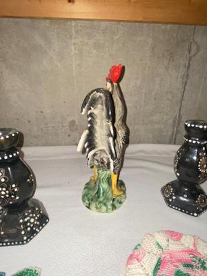 ROOSTER, CANDLESTICK HOLDERS, AND COLORFUL DOILIES,