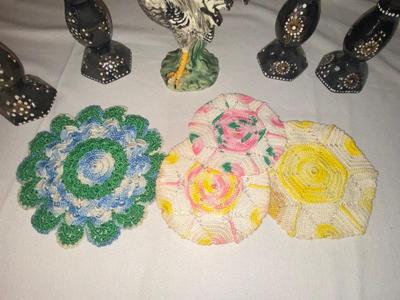 ROOSTER, CANDLESTICK HOLDERS, AND COLORFUL DOILIES,