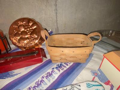 LONGBERGER BASKET , COPPER MOLD, IRON MOOSE CANDLE HOLDER, 8 DINNER PLATES, TABLE CLOTH WITH LIKE OVEN MIT, GORHAM KNIFE & PIE SERVER...